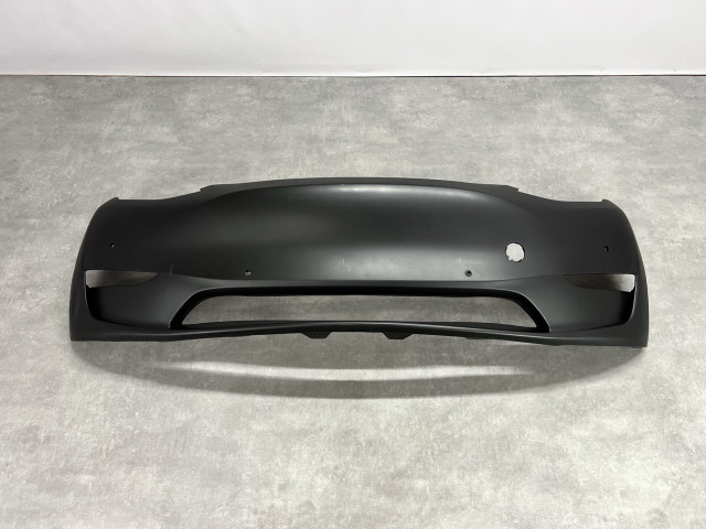 Передній бампер (з отворами під парк.) - Tesla Model Y (1493736-S0-A)